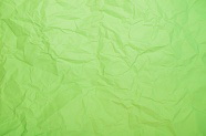 绿色褶皱纸张背景图片