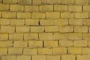 黄色砖墙背景照片