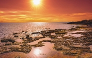 唯美黄昏海滩落日图片