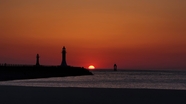 黄昏大海灯塔夕阳图片