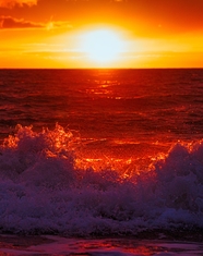 黄昏大海潮起潮落夕阳美景图片