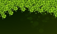绿色卡通幸运四叶草背景图片
