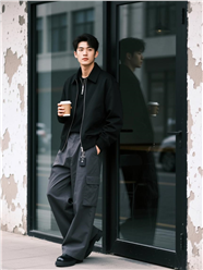 气质沉稳黑色夹克帅哥手持咖啡杯图片